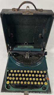 Blue Remington Model Portable Typewriter in Case