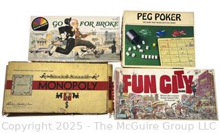 Four (4) Board Games Including Fun City, Peg Poker, Monopoly and Go For Broke
