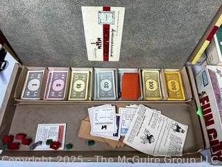 Four (4) Board Games Including Fun City, Peg Poker, Monopoly and Go For Broke