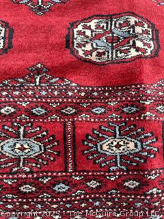Hand Knotted Pakistan Bokhara Jhaldar Wool Rug on Red Ground. 5' 7" x 4'