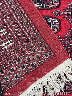 Hand Knotted Pakistan Bokhara Jhaldar Wool Rug on Red Ground. 6' 2" x 3' 3"