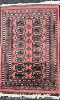 Hand-knotted Shiravan Bokhara Pakistani Wool Rug on Rose Ground. 