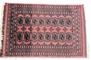 Hand-knotted Shiravan Bokhara Pakistani Wool Rug on Rose Ground. 