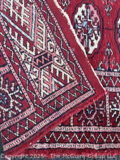 Hand-Knotted Pakistani Bokhara Wool Runner Rug on Red Ground. 31" x 111"