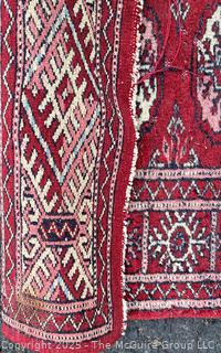 Hand-Knotted Pakistani Bokhara Wool Runner Rug on Red Ground. 31" x 111"
