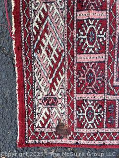 Hand-Knotted Pakistani Bokhara Wool Runner Rug on Red Ground. 31" x 111"