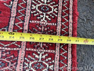 Hand-Knotted Pakistani Bokhara Wool Runner Rug on Red Ground. 31" x 111"