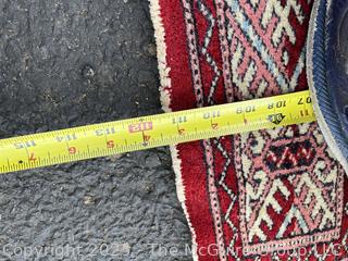 Hand-Knotted Pakistani Bokhara Wool Runner Rug on Red Ground. 31" x 111"