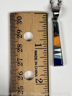 Sterling Silver with Inlaid Stone Pendant Necklace Signed by Navajo Artist Calvin Begay 