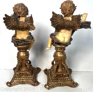 Pair of Cherubs on Pedestals 