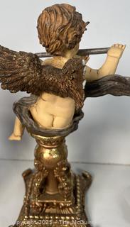 Pair of Cherubs on Pedestals 