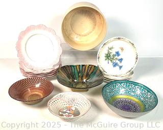 Collection of Porcelain Plates and Serving Bowls
