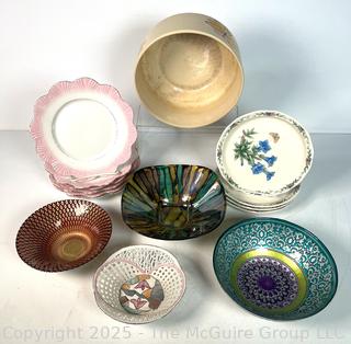 Collection of Porcelain Plates and Serving Bowls
