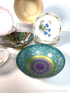 Collection of Porcelain Plates and Serving Bowls
