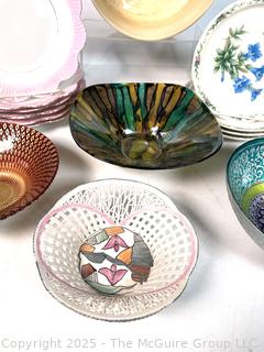 Collection of Porcelain Plates and Serving Bowls
