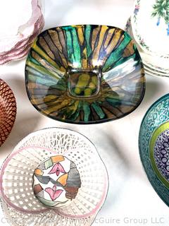 Collection of Porcelain Plates and Serving Bowls
