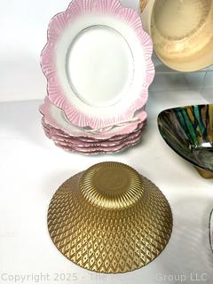 Collection of Porcelain Plates and Serving Bowls
