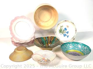 Collection of Porcelain Plates and Serving Bowls
