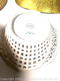 Collection of Porcelain Plates and Serving Bowls
