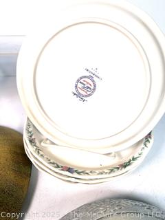 Collection of Porcelain Plates and Serving Bowls
