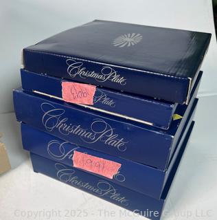 Thirteen (13) Royal Copenhagen Christmas Wall Plates in Boxes