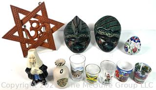 Group Including African Masks and Shot Glasses