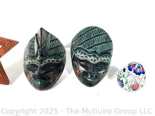 Group Including African Masks and Shot Glasses