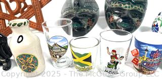 Group Including African Masks and Shot Glasses