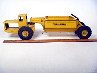 1950’s Metal Ny-Lint Yellow Tourneau Tournahopper V1 Toy Truck.  23”