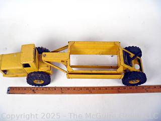 1950’s Metal Ny-Lint Yellow Tourneau Tournahopper V1 Toy Truck.  23”