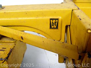 1950’s Metal Ny-Lint Yellow Tourneau Tournahopper V1 Toy Truck.  23”