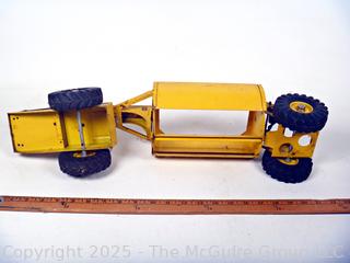 1950’s Metal Ny-Lint Yellow Tourneau Tournahopper V1 Toy Truck.  23”