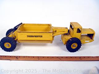 1950’s Metal Ny-Lint Yellow Tourneau Tournahopper V1 Toy Truck.  23”