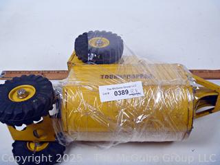 1950’s Metal Ny-Lint Yellow Tourneau Tournahopper V1 Toy Truck.  23”