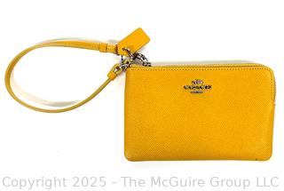 Yellow Leather Coach Wristlet