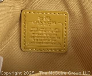 Yellow Leather Coach Wristlet