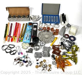 Collection of Party Ware Including Napkin Rings, Knife Rests, Wine Charms, Chop Sticks, and More