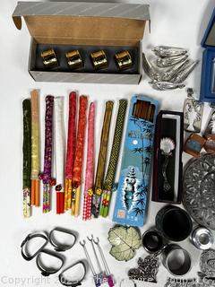 Collection of Party Ware Including Napkin Rings, Knife Rests, Wine Charms, Chop Sticks, and More