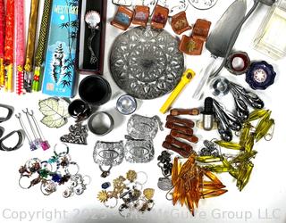 Collection of Party Ware Including Napkin Rings, Knife Rests, Wine Charms, Chop Sticks, and More