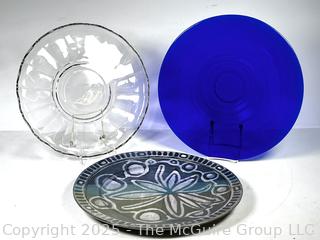 Three (3) Round Serving Platters in Pottery and Glass