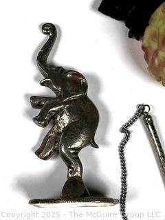 Wood Bee Hive String Holder, Elephant Figure, Art Glass, Porcelain Dolls, Pencil Holder and Victorian Door Knob.
