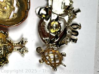 Nine (9) Costume Jewelry Holiday Themed Brooches