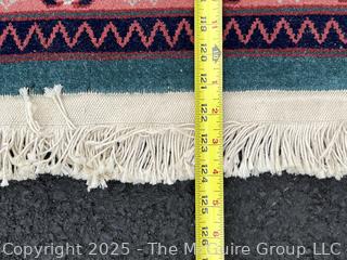 Hand-knotted Wool Tabriz Rug on Blue Ground with Red Border. 94 x 124"