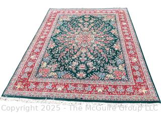 Hand-knotted Persian Tabriz Wool Rug on Green Ground. 109 x 156”
