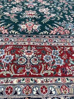 Hand-knotted Persian Tabriz Wool Rug on Green Ground. 109 x 156”