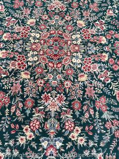 Hand-knotted Persian Tabriz Wool Rug on Green Ground. 109 x 156”