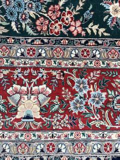 Hand-knotted Persian Tabriz Wool Rug on Green Ground. 109 x 156”