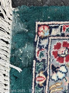 Hand-knotted Persian Tabriz Wool Rug on Green Ground. 109 x 156”
