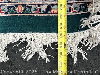 Hand-knotted Persian Tabriz Wool Rug on Green Ground. 109 x 156”