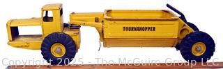 1950’s Metal Ny-Lint Yellow Tourneau Tournahopper V1 Toy Truck.  23”